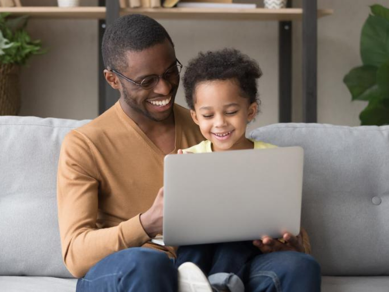 father and son on computer