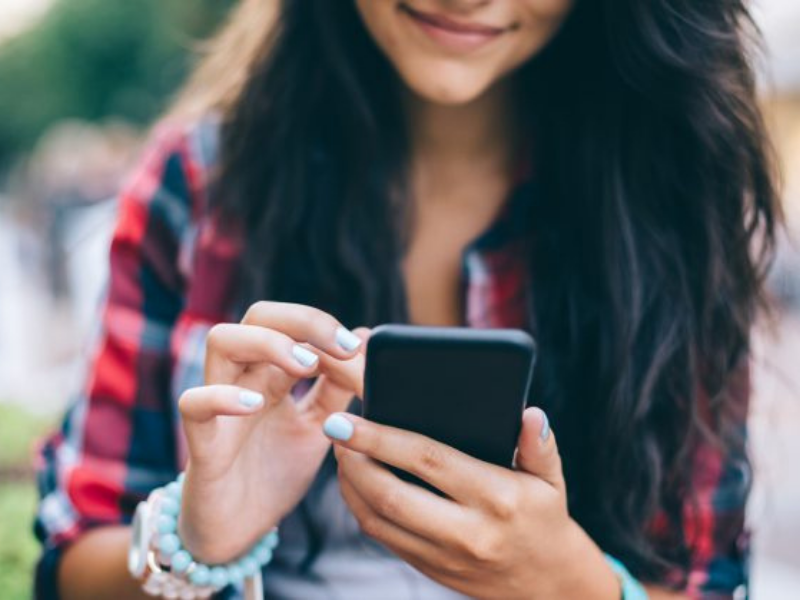 teenager on phone image