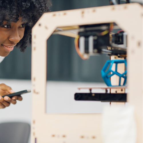 woman watching 3d printer