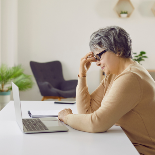 confused woman at laptop