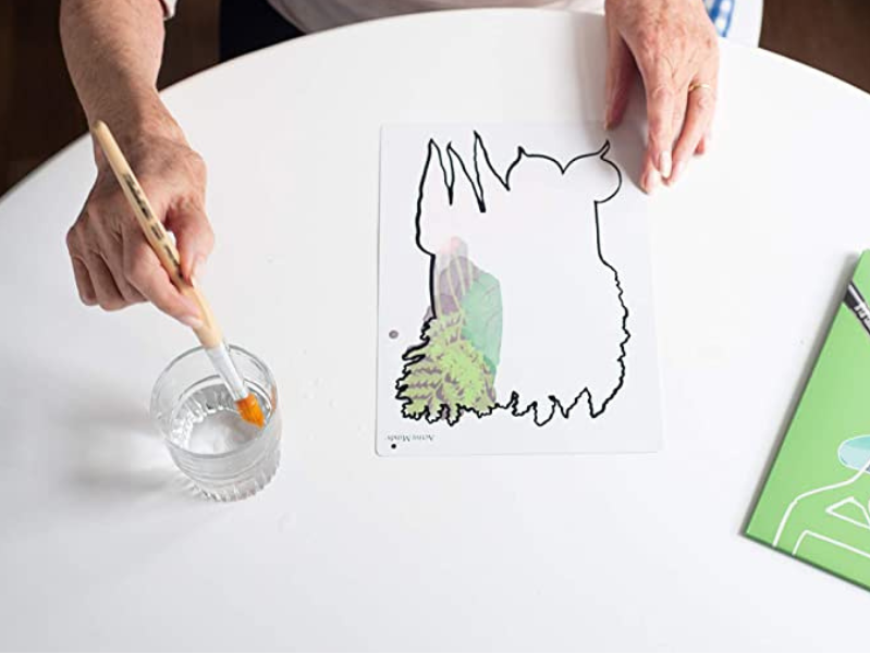 person painting with aquapaint